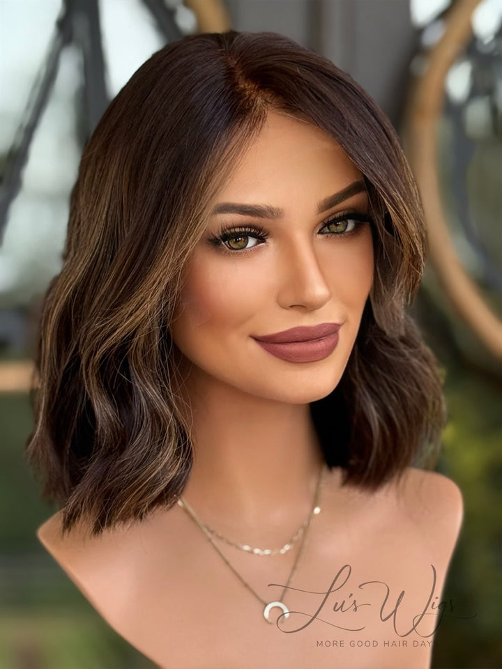 Sleek human hair bob cut wig with a natural, shiny finish